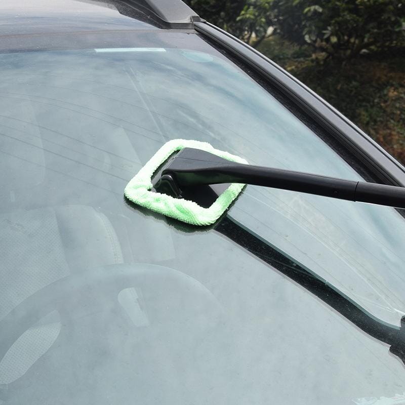 Close-up of ergonomic car windshield cleaner handle designed for comfortable and effective auto care.