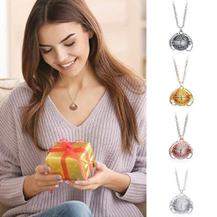 Expanding angel wing locket necklace for women, holding multiple photos, a sentimental keepsake gift.