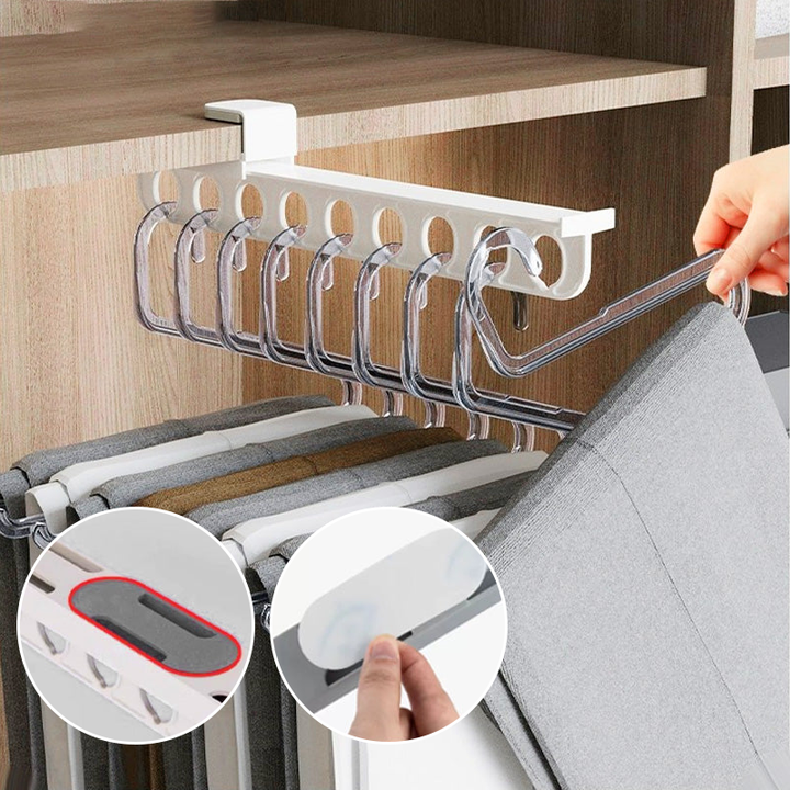 Extendable wardrobe organizer shelf for closet storage, maximizing space effectively.