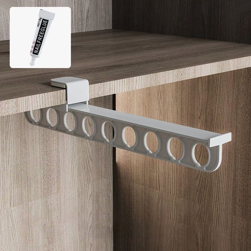 Pull-out wardrobe organizer shelf, a space-saving solution for modern homes.