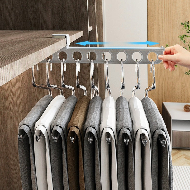 White extendable wardrobe shelf, ideal for decluttering and organizing any closet.