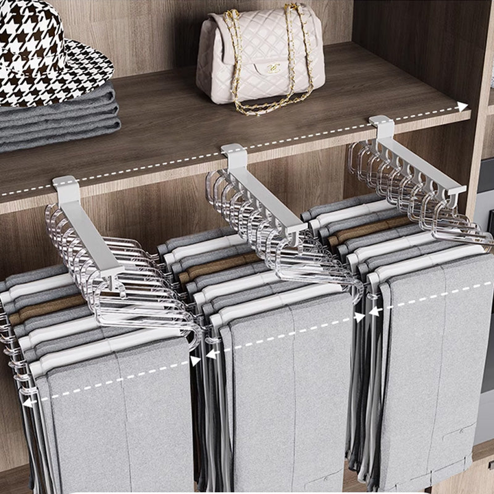 Extendable plastic organizer shelf for wardrobe, offering flexible storage solutions.