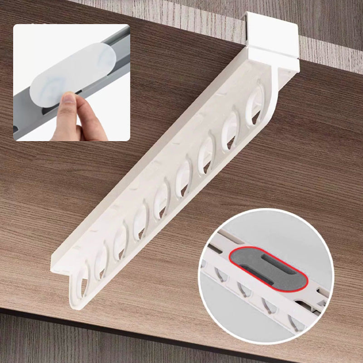 Detail of an extendable wardrobe organizer shelf showing its adjustable features.