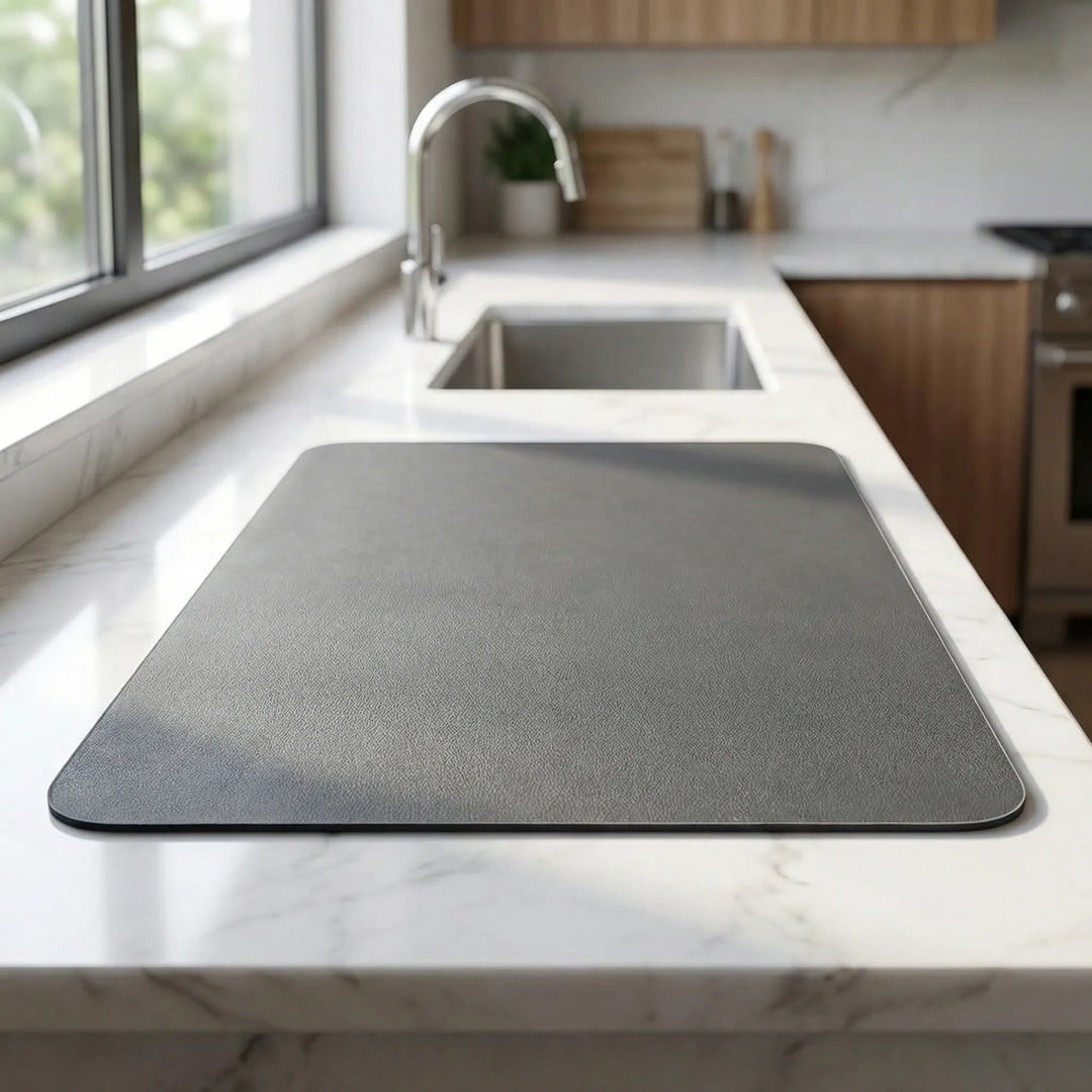 Fast drying kitchen dish mat with absorbent, non-slip surface, protecting countertops. Ideal for quick dish drying.