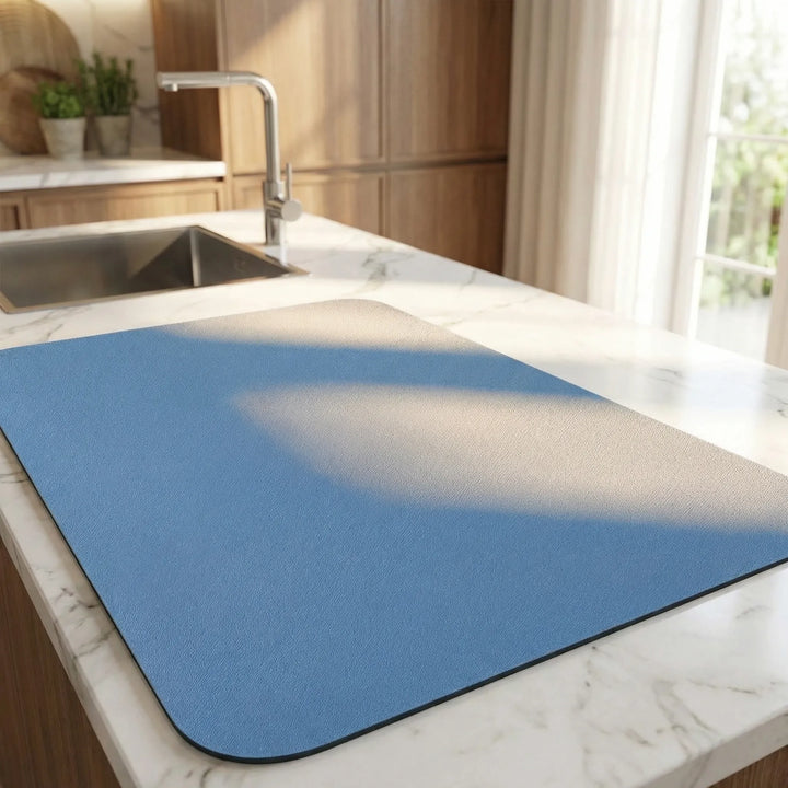 Efficient home kitchen dish drying mat. Fast absorbent, non-slip, protects countertops, and saves space.