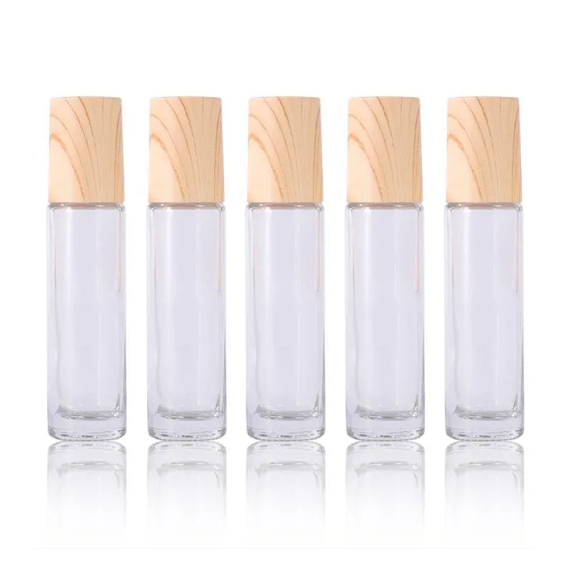Close-up of the elegant design of a refillable essential oil roller bottle, with secure cap and smooth roller