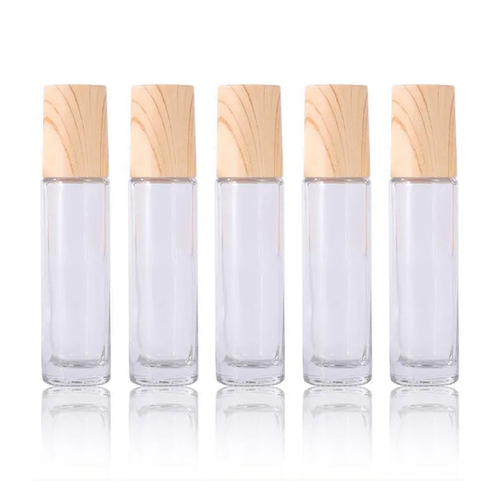Close-up of the elegant design of a refillable essential oil roller bottle, with secure cap and smooth roller