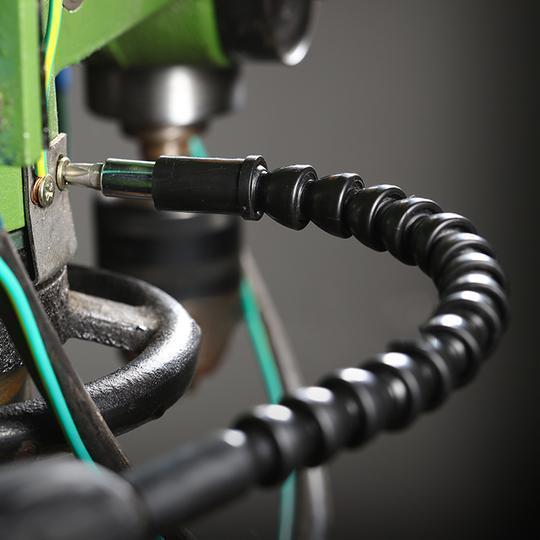 Innovative flexible drill extension & screwdriver bit holder for automotive or household repairs.