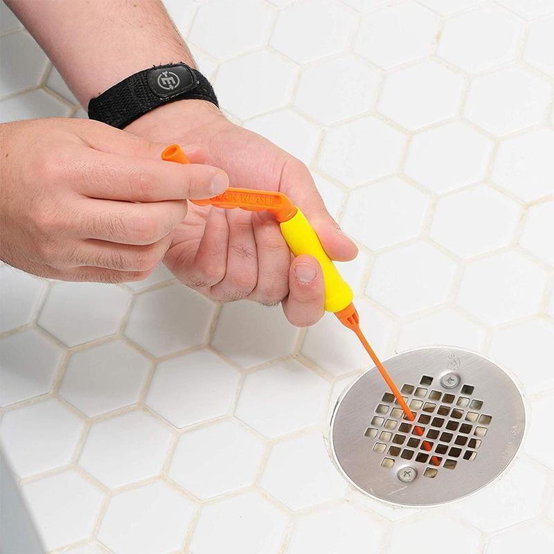 Close-up of a drain hair clog remover tool with barbed edges, designed for effective hair extraction