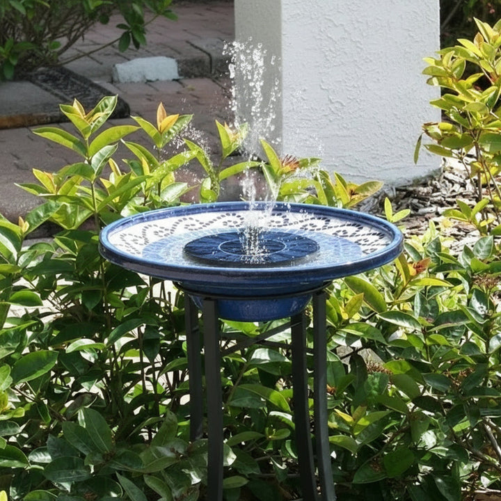 Decorative floating solar water fountain for garden ponds, bird baths, or patio water features. Adds ambiance to backyard.