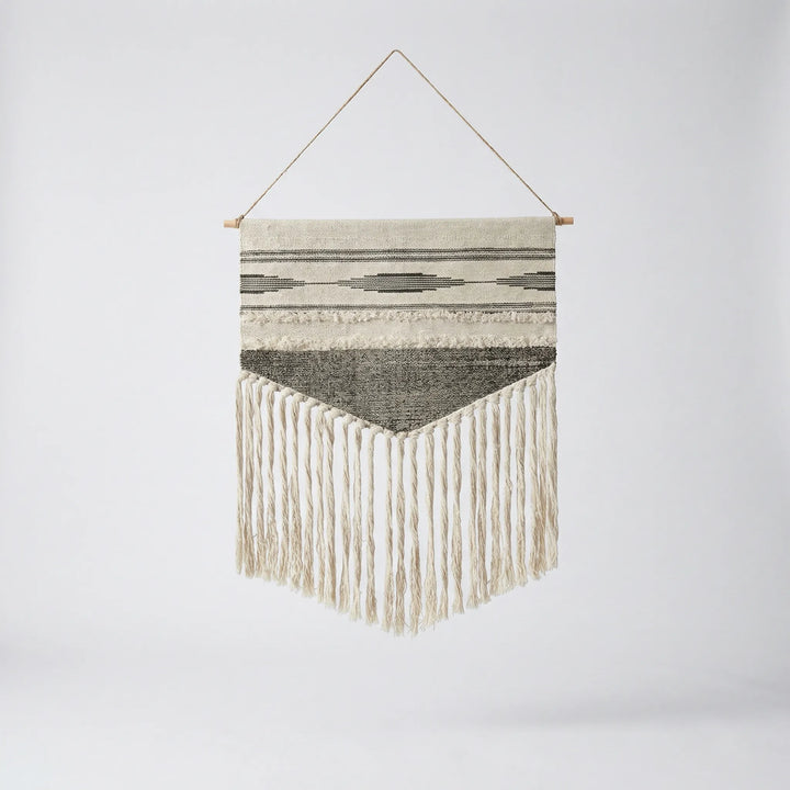 Statement Flowique wall hanging, geometric waves & fringe. Neutral modern boho art for living spaces.