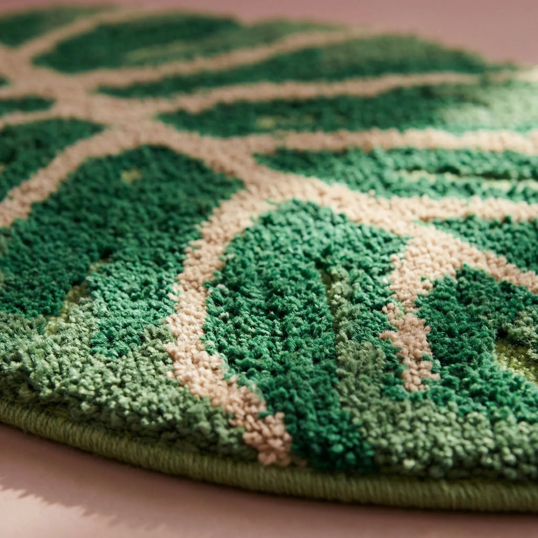 Soft botanical leaf area rug with wave pattern; green decorative indoor rug, perfect for a cozy living space.
