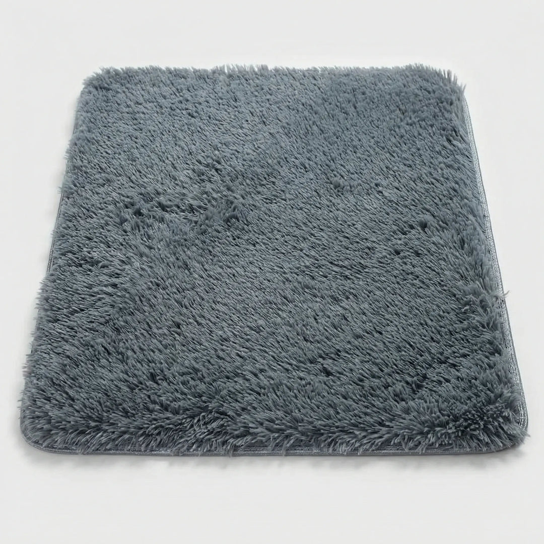 Statement Persian style washable floor mat with unique wave design, low pile, ideal non-slip rug for home entry.
