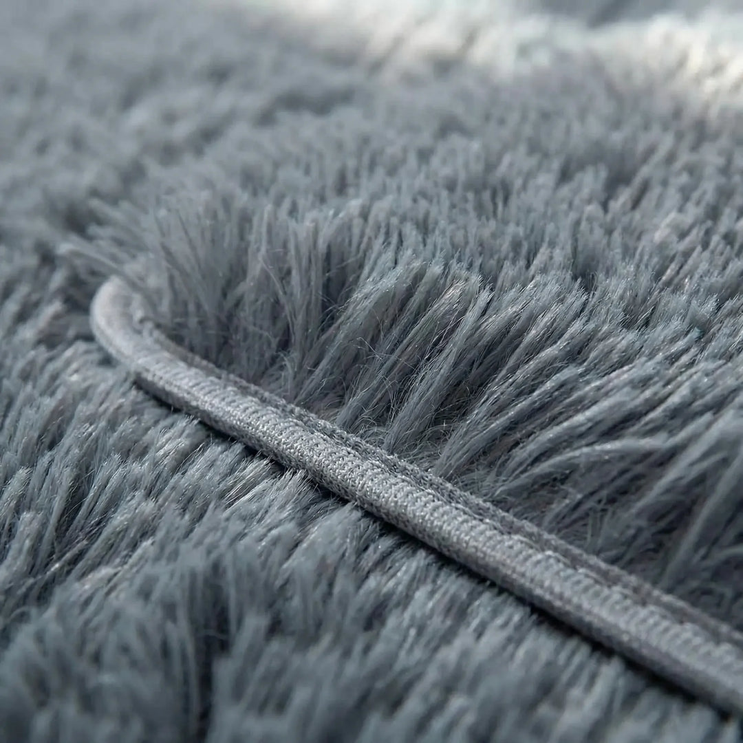 Washable indoor non-slip area rug, low pile, featuring a modern wave pattern, great as an entryway or bath mat.