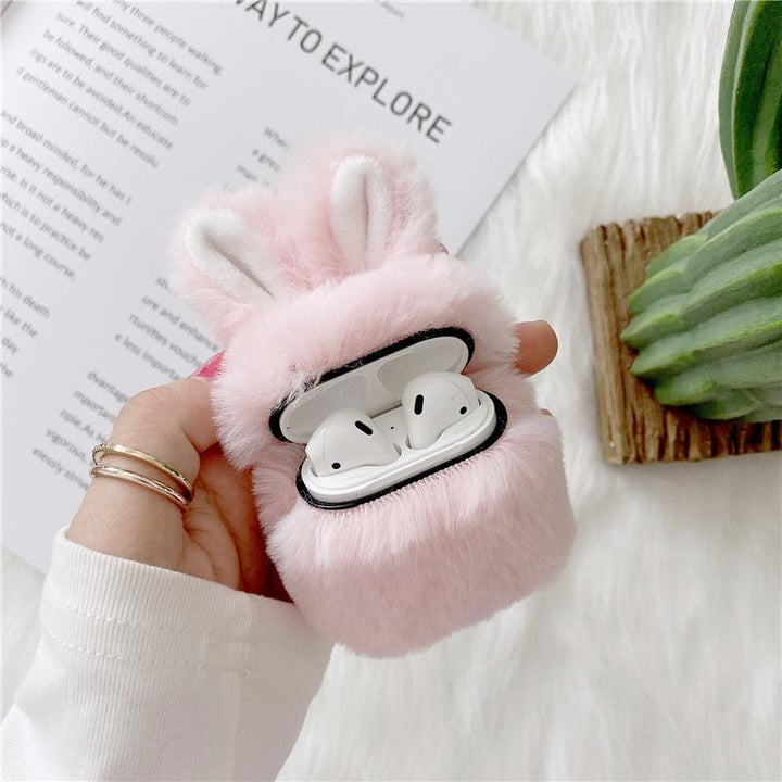 Close-up of fluffy grey earbud case texture, shockproof protective accessory