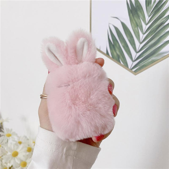Pink fluffy earbud case for earphones, cruelty-free, accessory with durable keychain