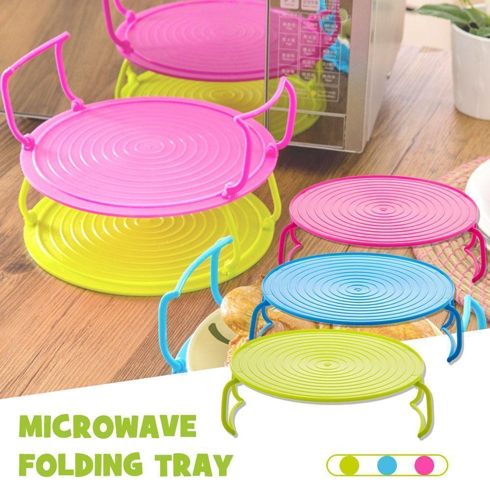 Folding microwave tray, set of 2, for kitchen organization, space-saving storage and food heating.