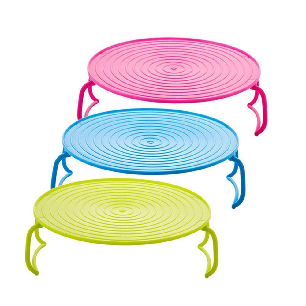 Compact folding microwave tray pair, a clever kitchen accessory for heating and saving counter space.
