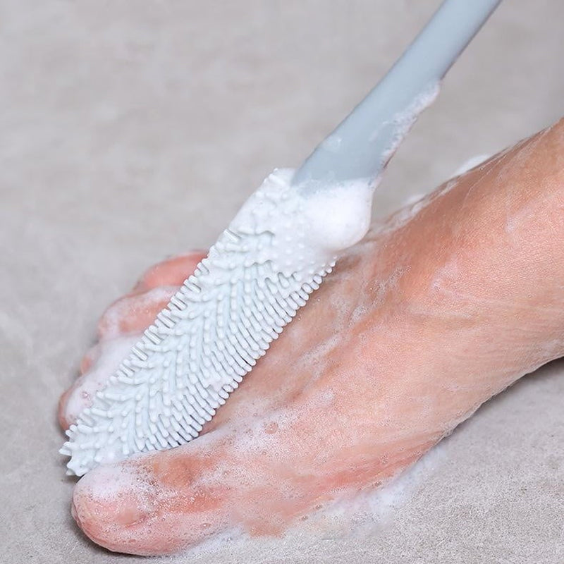 Foot hygiene brush with suction cups for grip in shower or tub