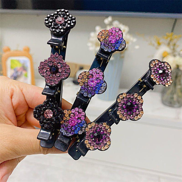 Close-up of the intricate crystal stone and braided detail on a hair clip