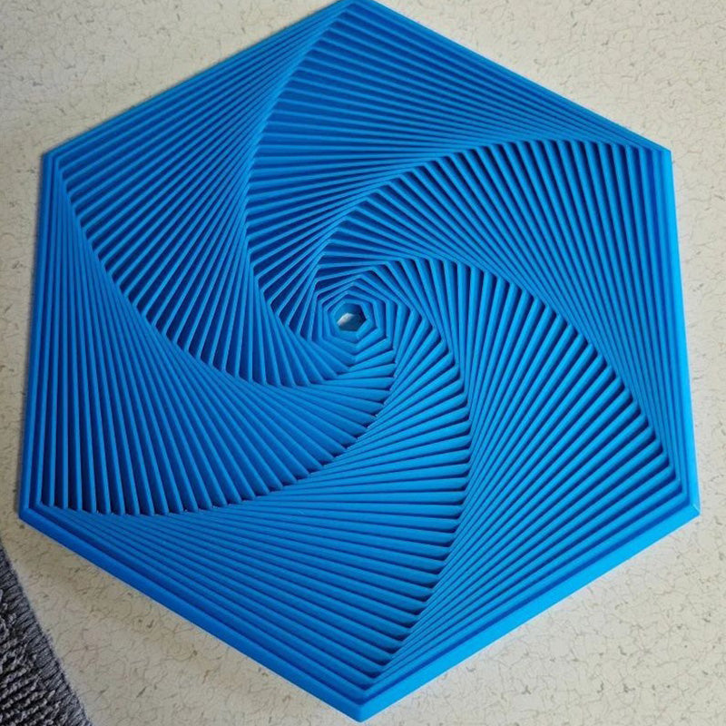 Abstract shot of a Fractal Fidget Hexagon, emphasizing its intricate, repeating patterns