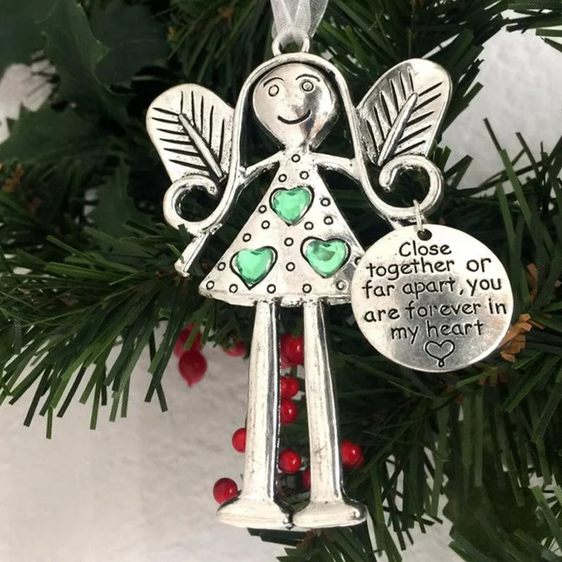 Artistic shot of Friendship Angel iron ornament, emphasizing its craftsmanship and festive appeal