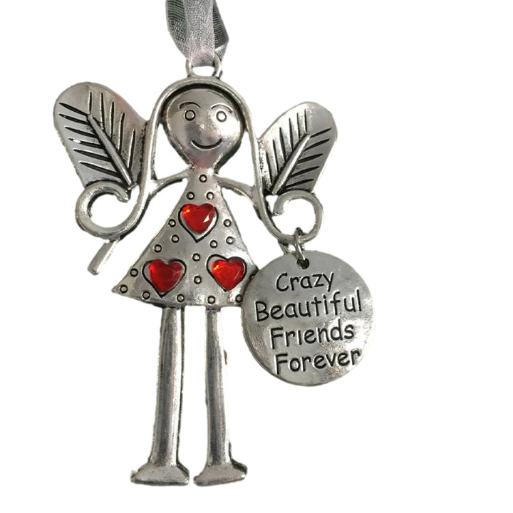 Detailed shot of Friendship Angel, showcasing metalwork, lovely sentimental holiday decor