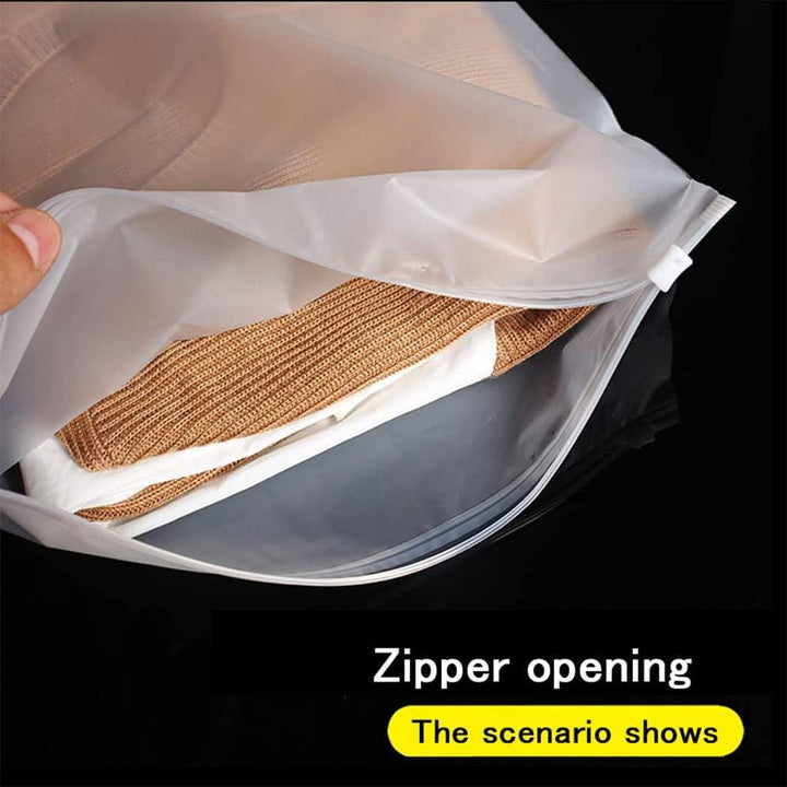 Clear frosted clothing storage bags with vent holes ensure breathability & easy access.