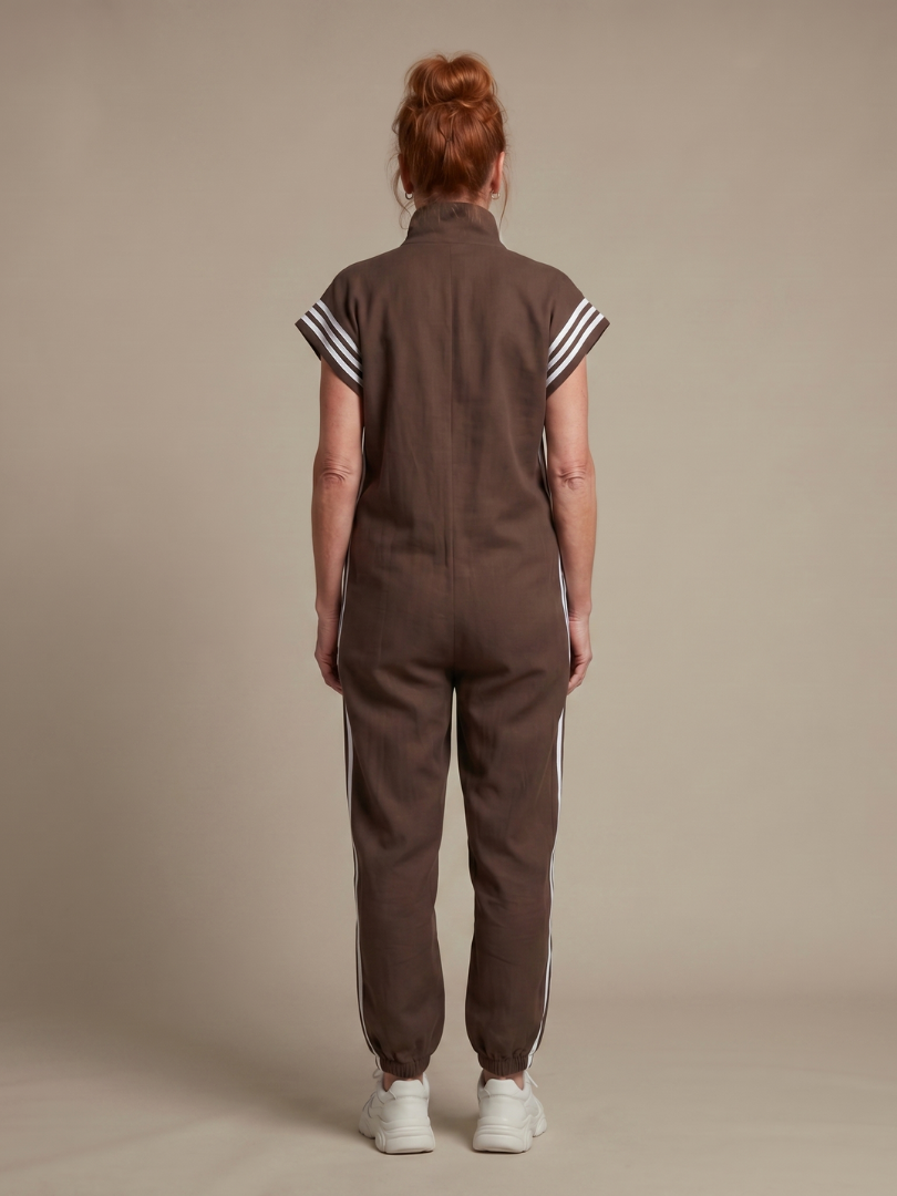 Casual full-length women's jumpsuit with a sporty side stripe and comfortable relaxed fit.