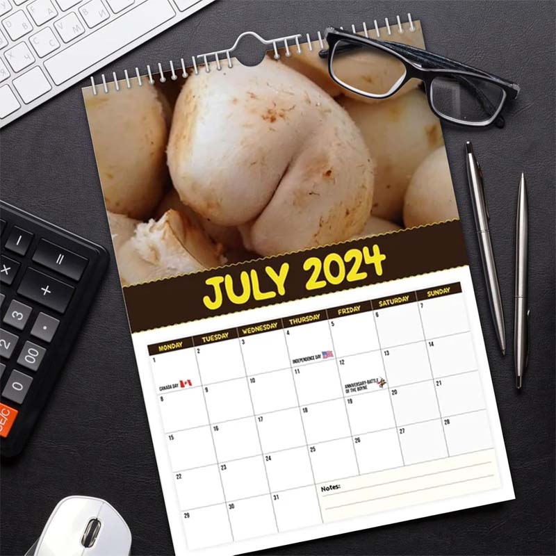 Fungi Wall Calendar displayed with other stationery, highlighting its aesthetic as a unique gift item