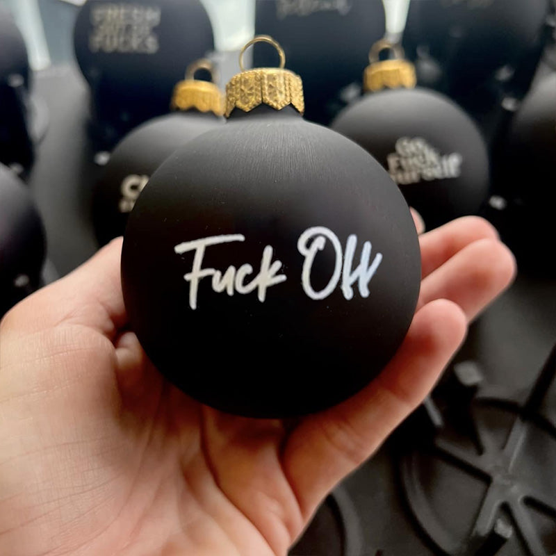 Festive Christmas bauble with a humorous quote, perfect for adult holiday decor