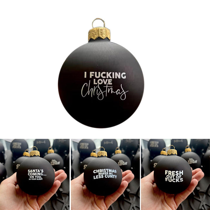 Assorted humorous Christmas baubles with various adult-themed sayings, holiday decor