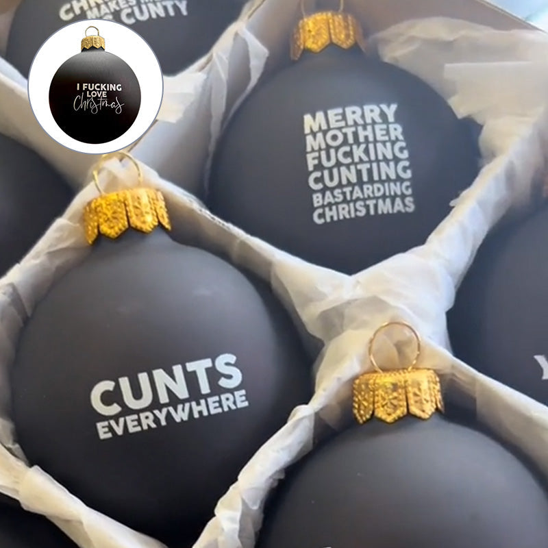 Christmas tree with funny adult baubles, adding a touch of humor to holiday decor