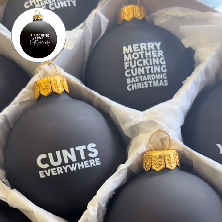 Christmas tree with funny adult baubles, adding a touch of humor to holiday decor