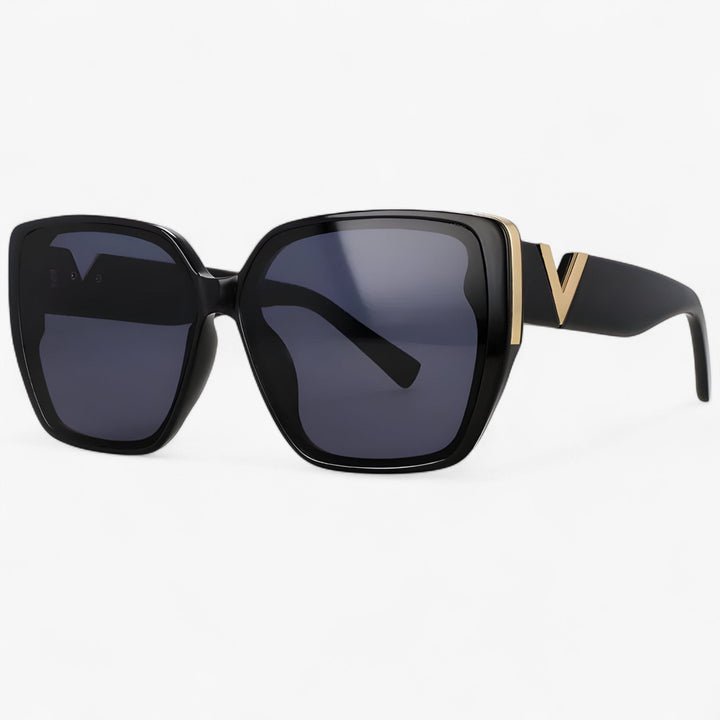 Futuristic V-shaped mirrored sunglasses for a bold, trendy look. Unisex fashion eyewear with UV400 protection.