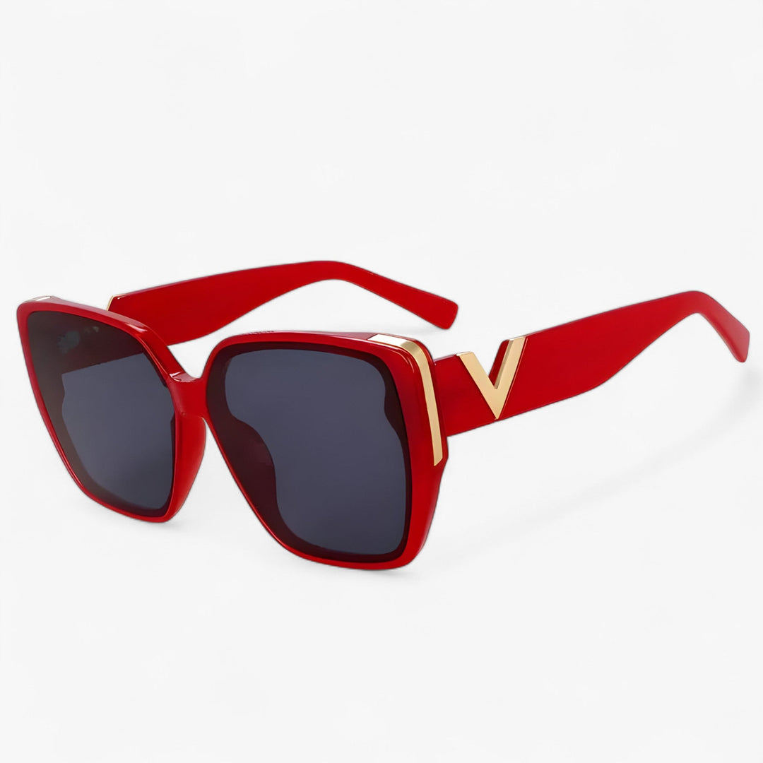 Bold V-shaped mirrored sunglasses. Futuristic unisex eyewear for a trendy fashion statement. UV400 protection included.