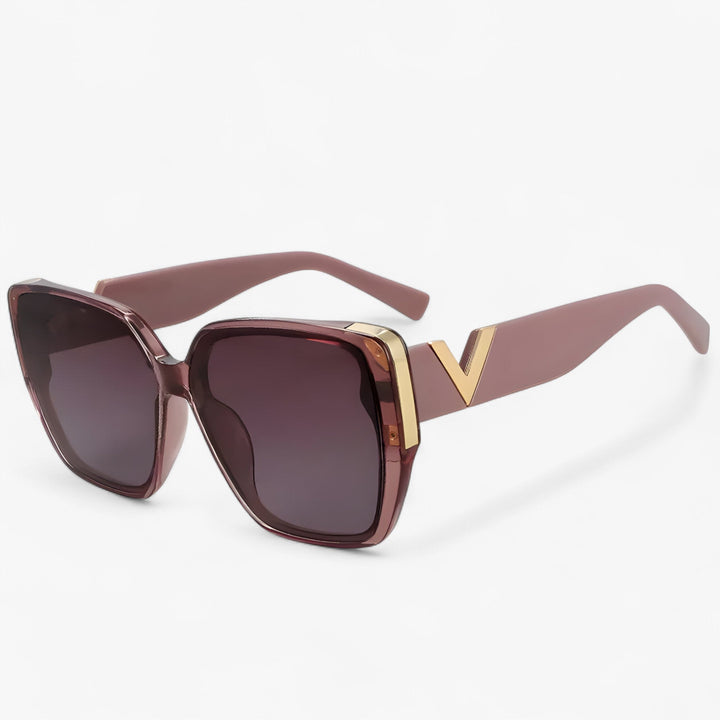Statement V-shaped mirrored sunglasses offering UV400 protection. Unisex and trendy, perfect for a futuristic look.
