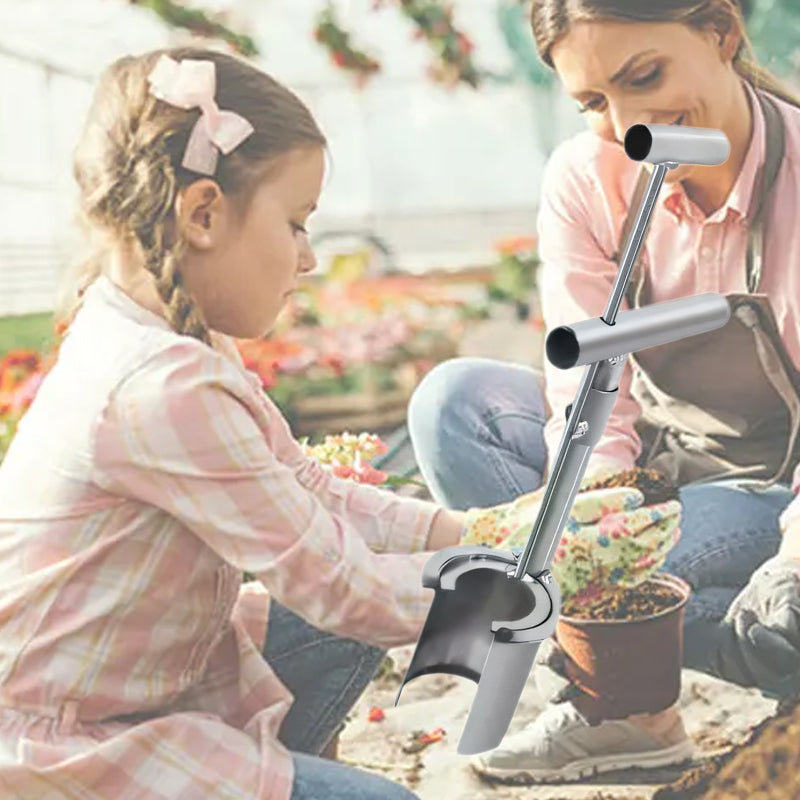 Gardener using the planting and transplant tool for new seedling placement