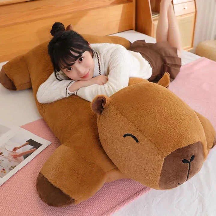Unisex giant capybara plush for ultimate comfort. This soft, cuddly stuffed animal brings joy.