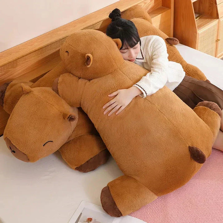 This giant capybara plush is a soft, cuddly companion, providing comfort & stress relief for any age.