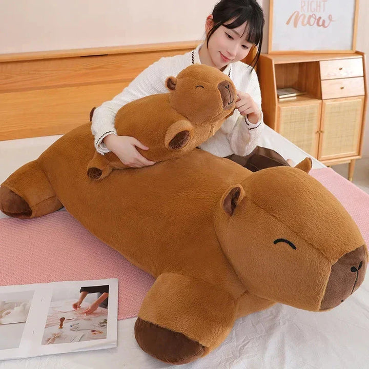 Large capybara stuffed animal with soft fur, a delightful comfort companion & cute gift plushie.