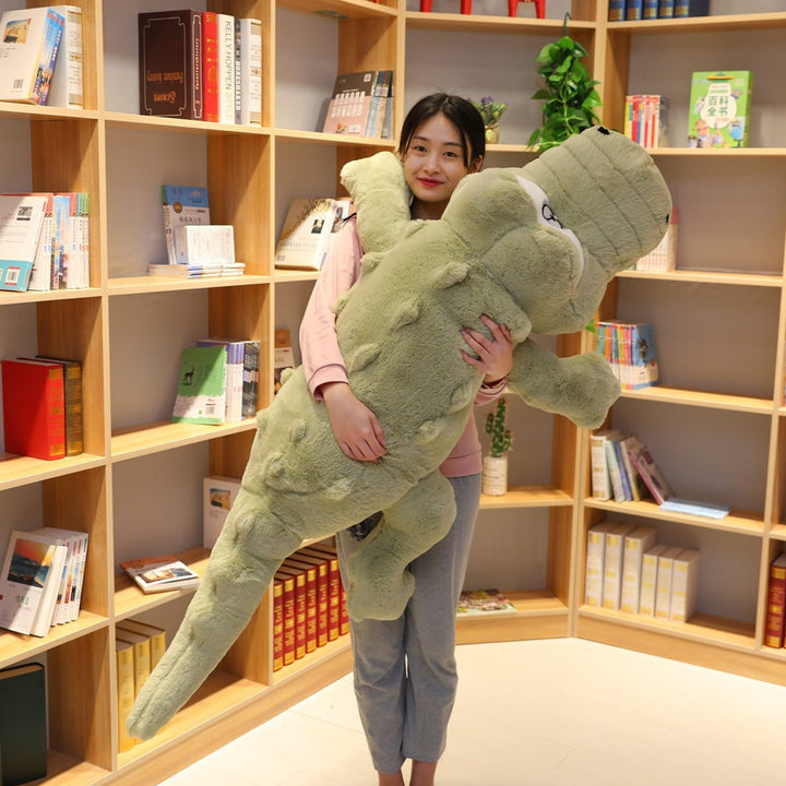 Giant crocodile plush pillow, soft & huggable companion. Perfect for kids & adults, an oversized stuffed animal.