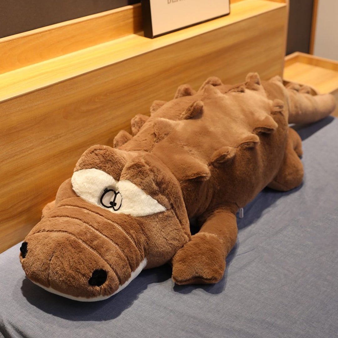 Soft giant crocodile plush pillow, a comfortable huggable toy. Great hypoallergenic stuffed animal gift for all ages.