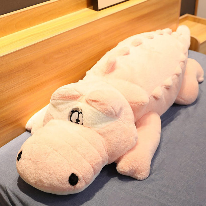 Unisex giant crocodile plush pillow, a soft, machine washable stuffed animal. Perfect huggable comfort gift for kids/adults.