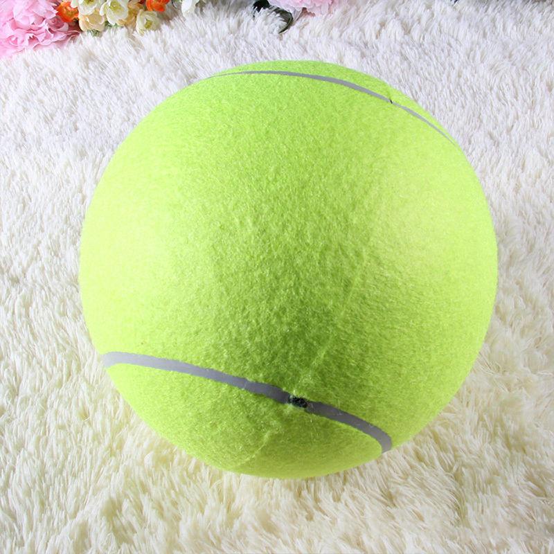 Bright yellow giant pet tennis ball, an engaging interactive dog toy for outdoor fun.