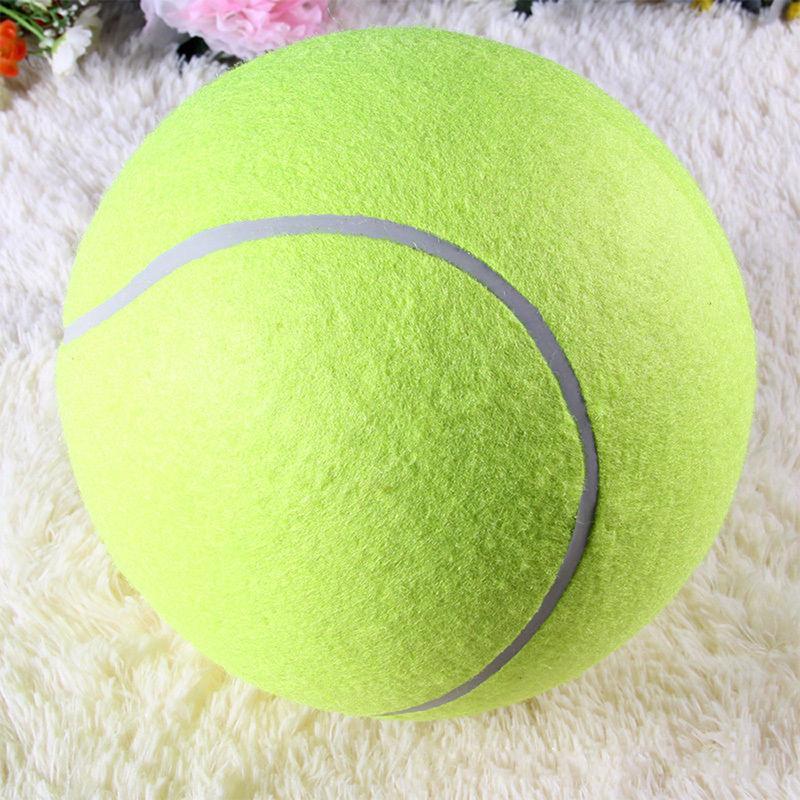 Close-up of a giant pet tennis ball dog toy, highlighting its texture and robust design.