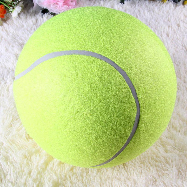 Close-up of a giant pet tennis ball dog toy, highlighting its texture and robust design.