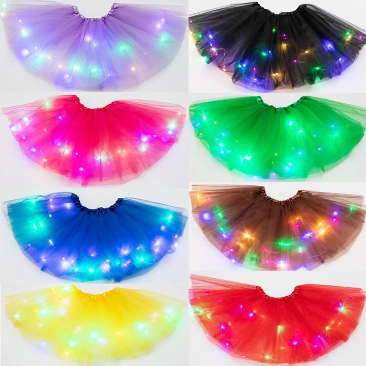 Group of girls wearing different colored LED tutu skirts, vibrant dance costumes, glowing