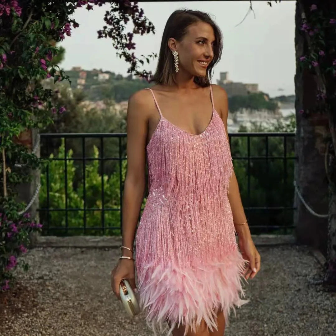 Dazzling women's sequin & fringe mini cocktail dress for special occasions, parties, and evening wear. Dance-ready.