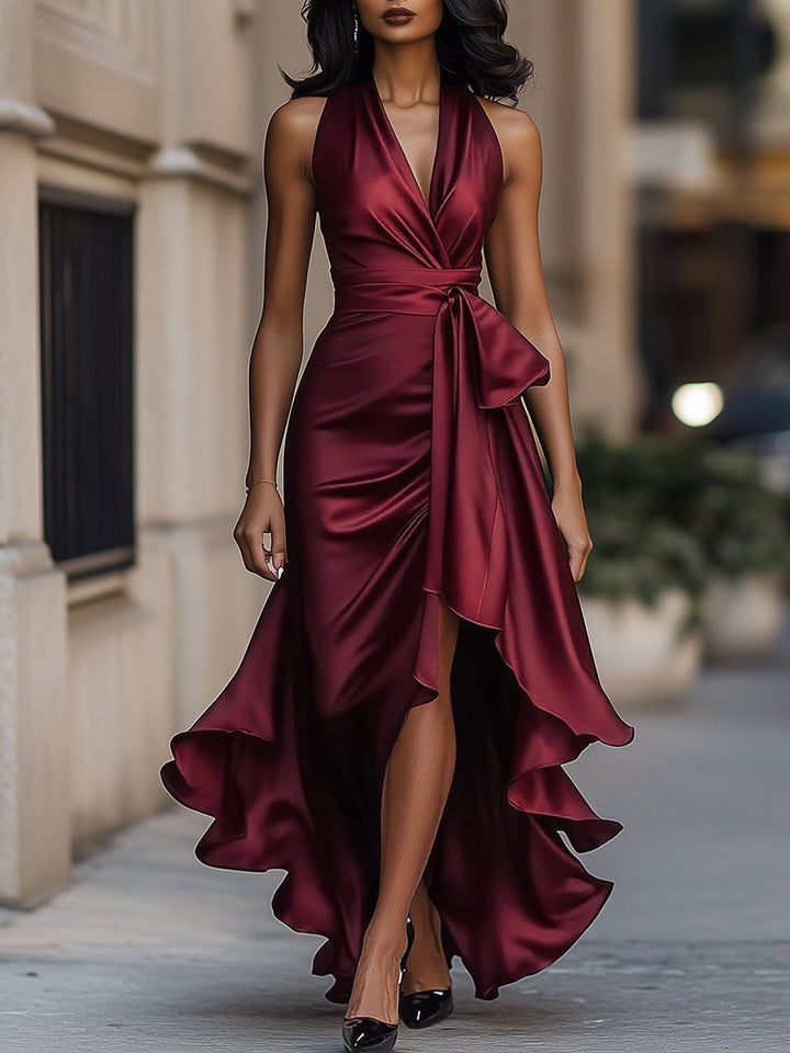 Flattering women's wrap maxi dress with a deep V-neckline, glamorous for evening wear, parties & galas.